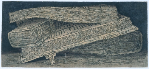 An etching of a pile of books